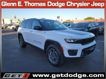 2022 Jeep Grand Cherokee Trailhawk 4xe in a Bright White Clear Coat exterior color and Global Blackinterior. Glenn E Thomas 100 Years Of Excellence (866) 340-5075 getdodge.com 