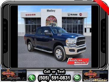 2024 RAM 2500 Tradesman Crew Cab 4x4 6'4' Box in a Patriot Blue Pearl Coat exterior color. Melloy Dodge RAM FIAT 505-588-4459 melloydodge.com 