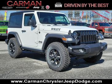 2023 Jeep Wrangler 2-door Willys 4x4 in a Bright White Clear Coat exterior color and Blackinterior. Carman Chrysler Jeep Dodge Ram 302-317-2378 carmanchryslerjeepdodge.com 