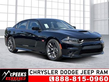 2023 Dodge Charger Scat Pack in a Pitch Black exterior color and Blackinterior. McPeek's Chrysler Dodge Jeep Ram of Anaheim 888-861-6929 mcpeeksdodgeanaheim.com 