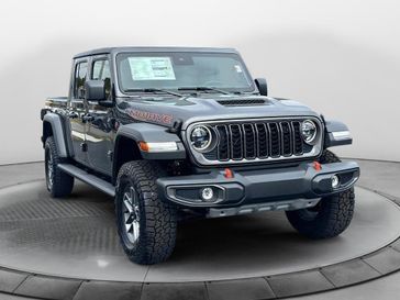 2024 Jeep Gladiator Mojave 4x4 in a Granite Crystal Metallic Clear Coat exterior color and Green/Blackinterior. Stan McNabb Chrysler Dodge Jeep Ram FIAT 931-408-9662 stanmcnabbcdjr.com 