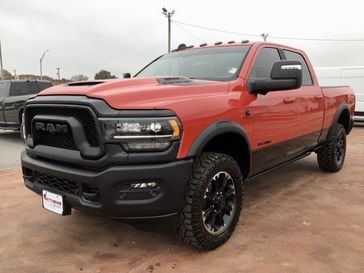 2024 RAM 2500 Rebel Crew Cab 4x4 6'4' Box in a Flame Red Clear Coat exterior color and Blackinterior. Matthews Chrysler Dodge Jeep Ram 918-276-8729 cyclespecialties.com 