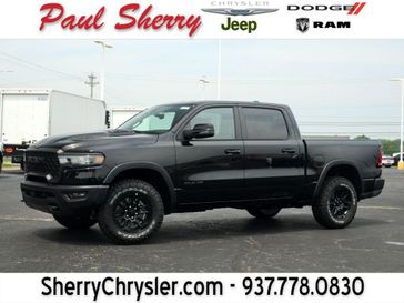 New 2026 RAM 1500 Rebel Crew Cab 4x4 5'7' Box Diamond Black Crystal Pearl Coat