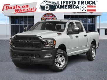 2023 RAM 2500 Tradesman in a Bright White Clear Coat exterior color and Diesel Gray/Blackinterior. Lifted Truck America 888-267-0644 liftedtruckamerica.com 