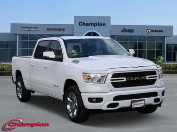 2024 RAM 1500 Big Horn Crew Cab 4x4 6'4' Box in a Bright White Clear Coat exterior color and DELUXE CLOTHinterior. Champion Chrysler Jeep Dodge Ram 800-549-1084 pixelmotiondemo.com 