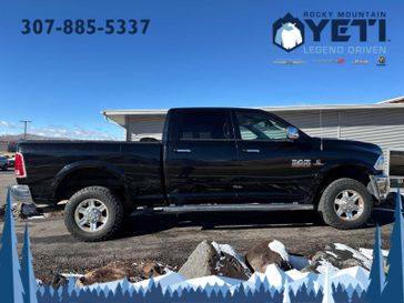 2013 RAM 2500 Laramie 4WD Crew Cab 149 in a Black exterior color and Blackinterior. Rocky Mountain Yeti Jackson Hole 307-733-5337 rockymountainyetijacksonhole.com 