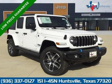 2024 Jeep Wrangler 4-door Sport S 4xe in a Bright White Clear Coat exterior color and Blackinterior. Wischnewsky Dodge 936-755-5310 wischnewskydodge.com 