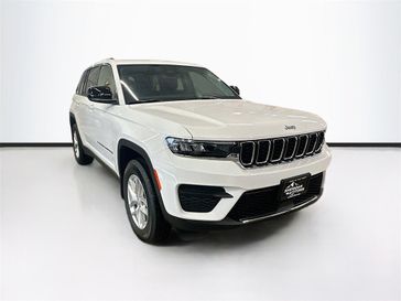2023 Jeep Grand Cherokee Laredo 4x4 in a Bright White Clear Coat exterior color and Blackinterior. Sheridan Motors CDJR 307-218-2217 sheridanmotor.com 