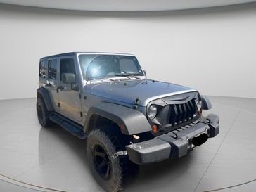 Used 2013 Jeep Wrangler Unlimited Sport