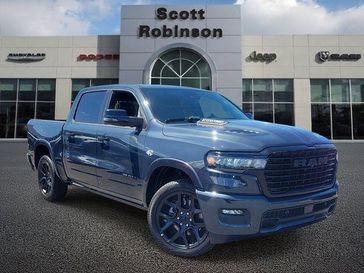 New 2026 RAM 1500 Laramie in a Blue exterior color and Blackinterior. Southbay Chrysler Jeep Dodge Ram (424) 404-5521 pixelmotiondemo.com 