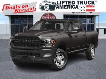 2024 RAM 2500 Tradesman in a Granite Crystal Metallic Clear Coat exterior color and Diesel Gray/Blackinterior. Lifted Truck America 888-267-0644 liftedtruckamerica.com 