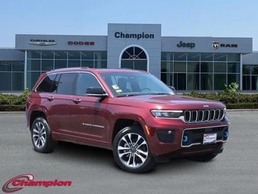 2023 Jeep Grand Cherokee Overland 4xe in a Velvet Red Pearl Coat exterior color and NAPPA LEATHERinterior. Champion Chrysler Jeep Dodge Ram 800-549-1084 pixelmotiondemo.com 