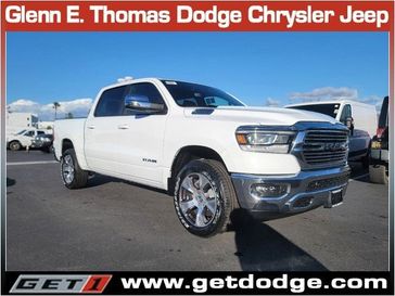 2024 RAM 1500 Laramie Crew Cab 4x4 5'7' Box in a Bright White Clear Coat exterior color and Blackinterior. Glenn E Thomas 100 Years Of Excellence (866) 340-5075 getdodge.com 