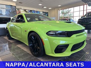 2023 Dodge Charger Scat Pack Widebody in a Sublime exterior color and Blackinterior. McCarthy Jeep Ram 816-434-0674 mccarthyjeepram.com 