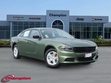 2023 Dodge Charger SXT Rwd in a F8 Green exterior color and Blackinterior. Champion Chrysler Jeep Dodge Ram 800-549-1084 pixelmotiondemo.com 