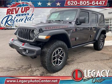 2024 Jeep Wrangler 4-door Rubicon in a Granite Crystal Metallic Clear Coat exterior color and Blackinterior. Legacy Auto Center 620-315-9264 legacyautocenter.net 