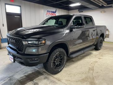 New 2026 RAM 1500 Rebel Crew Cab 4x4 5'7' Box in a Granite Crystal Metallic Clear Coat exterior color and Blackinterior. Jensen Chrysler Dodge Jeep Ram 507-354-0542 jensenchryslerdodgejeepram.com 
