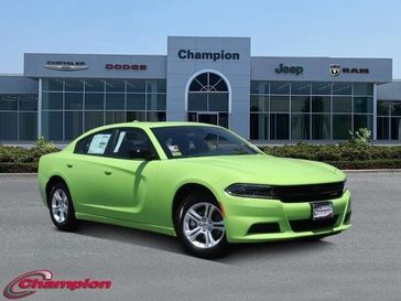 2023 Dodge Charger SXT Rwd in a Sublime exterior color and HOUNDSTOOTHinterior. Champion Chrysler Jeep Dodge Ram 800-549-1084 pixelmotiondemo.com 
