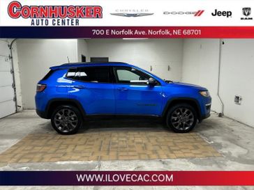 2021 Jeep Compass 80th Anniversary in a Laser Blue Pearl Coat exterior color and Blackinterior. Cornhusker Auto Center 402-866-8665 cornhuskerautocenter.com 