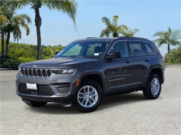 Used 2025 Jeep Grand Cherokee Laredo X 4x2 in a Baltic Gray Metallic Clear Coat exterior color and Global Blackinterior. Southbay Chrysler Jeep Dodge Ram (424) 404-5521 pixelmotiondemo.com 