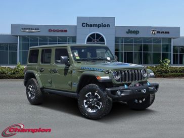 2024 Jeep Wrangler 4-door Rubicon X 4xe in a Sarge Green Clear Coat exterior color and NAPPA LEATHERinterior. Champion Chrysler Jeep Dodge Ram 800-549-1084 pixelmotiondemo.com 