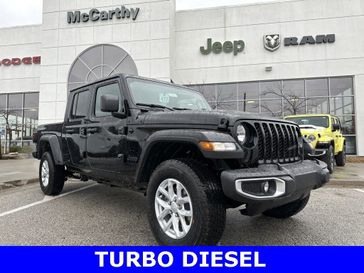 2023 Jeep Gladiator Sport S 4x4 in a Black Clear Coat exterior color and Blackinterior. McCarthy Jeep Ram 816-434-0674 mccarthyjeepram.com 