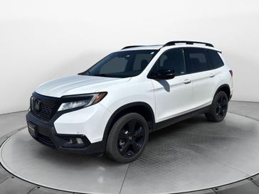 Used 2021 Honda Passport Elite in a Platinum White Pearl exterior color and Blackinterior. Perkins La Junta 719-383-2250 perkinslajunta.com 