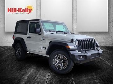 2023 Jeep Wrangler 2-door Sport S 4x4 in a Bright White Clear Coat exterior color and Blackinterior. Hill-Kelly Dodge (850) 786-2130 hillkellydodge.com 