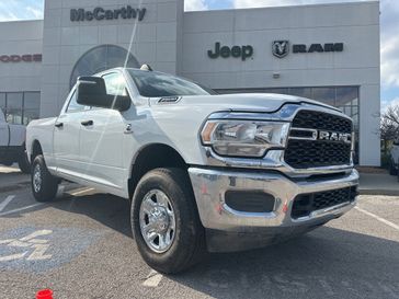 2024 RAM 2500 Tradesman Crew Cab 4x4 6'4' Box in a Bright White Clear Coat exterior color and Diesel Gray/Blackinterior. McCarthy Jeep Ram 816-434-0674 mccarthyjeepram.com 