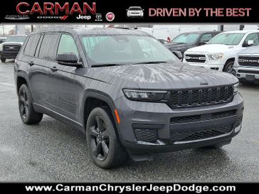 2021 Jeep Grand Cherokee L Altitude in a Baltic Gray Metallic Clear Coat exterior color and Global Blackinterior. Carman Chrysler Jeep Dodge Ram 302-317-2378 carmanchryslerjeepdodge.com 