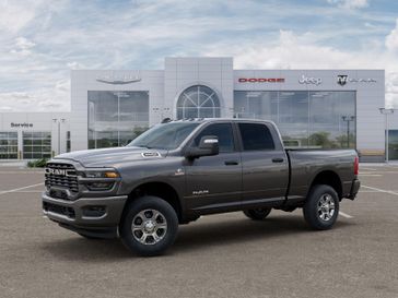 New 2025 RAM 3500 Big Horn Crew Cab 4x4 6'4' Box in a Granite Crystal Metallic Clear Coat exterior color. Kamaaina Motors 1-808-746-7956 kamaainamotors.com 