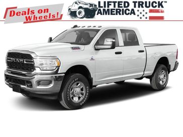 2023 RAM 3500 Tradesman in a Bright White Clear Coat exterior color and Diesel Gray/Blackinterior. Lifted Truck America 888-267-0644 liftedtruckamerica.com 