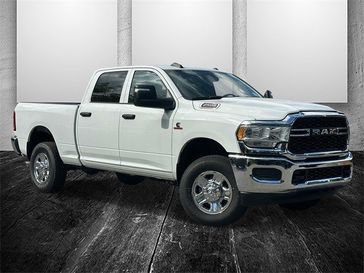 2024 RAM 2500 Tradesman Crew Cab 4x4 6'4' Box in a Bright White Clear Coat exterior color and Diesel Gray/Blackinterior. Hill-Kelly Dodge (850) 786-2130 hillkellydodge.com 