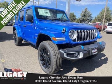 2024 Jeep Wrangler 4-door Sahara 4xe in a Hydro Blue Pearl Coat exterior color and Blackinterior. Legacy Chrysler Jeep Dodge RAM 541-663-4885 legacychryslerjeepdodgeram.com 