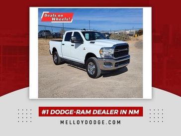 2023 RAM 3500 Tradesman in a Bright White Clear Coat exterior color and Blackinterior. Melloy Dodge RAM FIAT 505-588-4459 melloydodge.com 