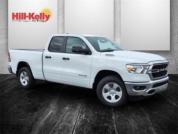 2023 RAM 1500 Big Horn Quad Cab 4x4 6'4' Box in a Bright White Clear Coat exterior color and Diesel Gray/Blackinterior. Hill-Kelly Dodge (850) 786-2130 hillkellydodge.com 