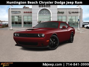 2023 Dodge Challenger GT in a Octane Red Pearl Coat exterior color and Blackinterior. BEACH BLVD OF CARS beachblvdofcars.com 