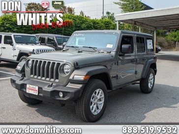 2023 Jeep Wrangler 4-Door Sport S in a Sting-Gray Clear Coat exterior color and Blackinterior. Don White's Timonium Chrysler Dodge Jeep Ram 410-881-5409 donwhites.com 