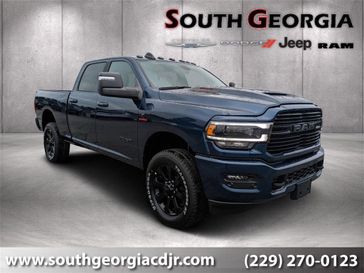 2024 RAM 2500 Laramie Crew Cab 4x4 6'4' Box in a Patriot Blue Pearl Coat exterior color and Blackinterior. South Georgia CDJR 229-443-1466 southgeorgiacdjr.com 