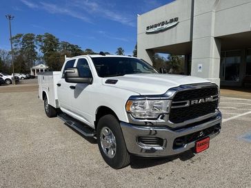 2024 RAM 2500 Tradesman Crew Cab 4x2 8' Box in a Bright White Clear Coat exterior color and Diesel Gray/Blackinterior. Randall Dodge Chrysler Jeep 877-790-6380 randalldodgechryslerjeep.com 