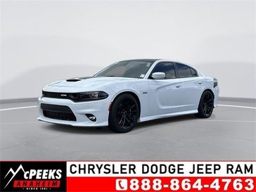 2022 Dodge Charger R/T Scat Pack in a White Knuckle Clear Coat exterior color and Blackinterior. McPeek's Chrysler Dodge Jeep Ram of Anaheim 888-861-6929 mcpeeksdodgeanaheim.com 