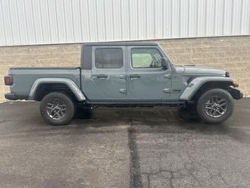 2024 Jeep Gladiator Sport S 4x4 in a Anvil Clear Coat exterior color and Blackinterior. Wilmington Auto Center Chrysler Dodge Jeep Ram (937) 556-6430 wilmingtonautocentercdjr.com 