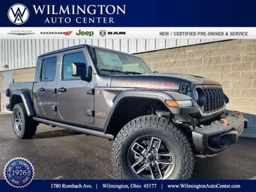 2024 Jeep Gladiator Mojave X 4x4 in a Granite Crystal Metallic Clear Coat exterior color and Green/Blackinterior. Wilmington Auto Center Chrysler Dodge Jeep Ram (937) 556-6430 wilmingtonautocentercdjr.com 