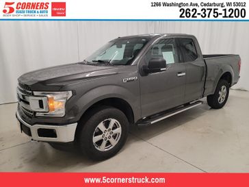 2018 Ford F-150 XLT in a Magnetic exterior color and Medium Earth Grayinterior. 5 Corners Dodge Chrysler Jeep 262-228-4109 5cornersdodgechryslerjeep.net 