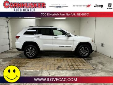 2022 Jeep Grand Cherokee WK Limited in a Bright White Clear Coat exterior color and Blackinterior. Cornhusker Auto Center 402-866-8665 cornhuskerautocenter.com 