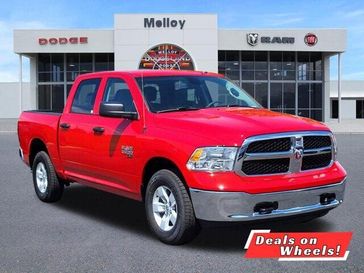 2023 RAM 1500 Classic Tradesman Crew Cab 4x4 5'7' Box in a Flame Red Clear Coat exterior color and Diesel Gray/Blackinterior. Melloy Dodge RAM FIAT 505-588-4459 melloydodge.com 