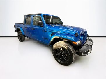 2023 Jeep Gladiator Sport S 4x4 in a Hydro Blue Pearl Coat exterior color and Blackinterior. Sheridan Motors Auto (307) 218-2217 sheridanmotors.com 