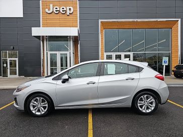 2019 Chevrolet Cruze LT in a Silver Ice Metallic exterior color and Jet Blackinterior. Victor Chrysler Dodge Jeep Ram 585-236-4391 victorcdjr.com 
