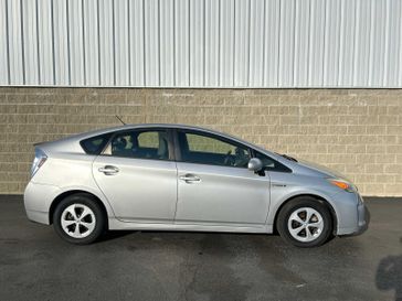 2013 Toyota Prius One in a Classic Silver Metallic exterior color and Dark Grayinterior. Wilmington Auto Center Chrysler Dodge Jeep Ram (937) 556-6430 wilmingtonautocentercdjr.com 