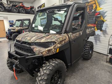 2024 Polaris Ranger XP 1000 NorthStar Edition Ultimate in a Camouflage exterior color. Mettler Implement mettlerimplement.com 